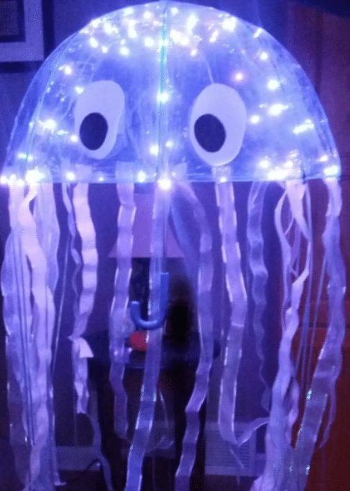Jellyfish Halloween costume made from an umbrella and some lights