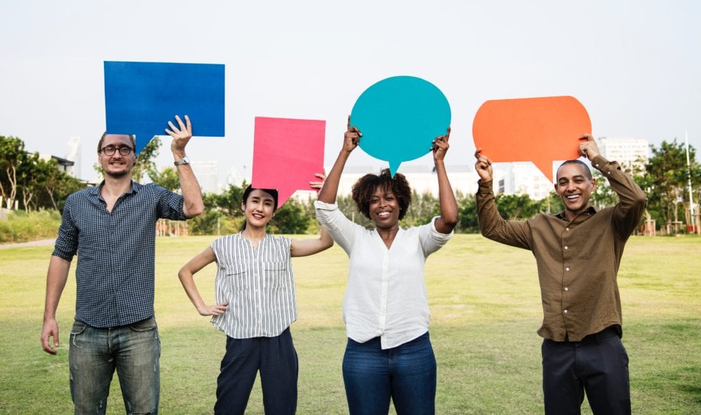 Coworkers with speech bubbles, symbolizing big updates for Microsoft Teams