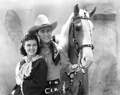 A cowboy with his horse and sweetie, symbolizing a white hat hacker.