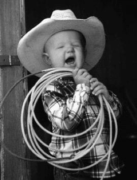 Young boy with lasso, symbolizing a script kiddie.