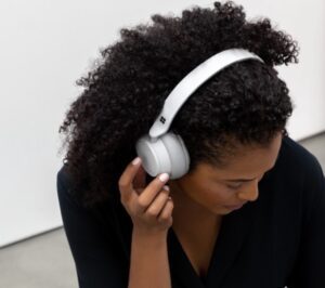 Image of a woman wearing Surface 2 headphones.